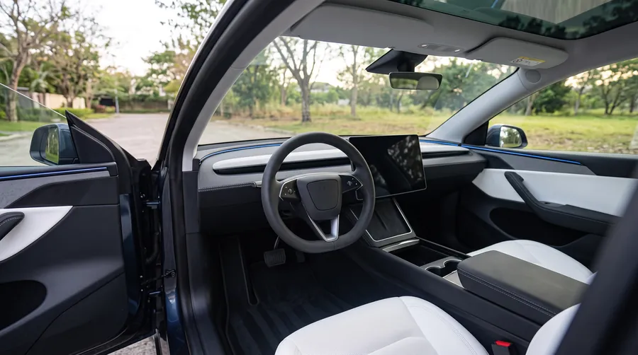 Spotless white interior of a Tesla Model Y after an interior detail